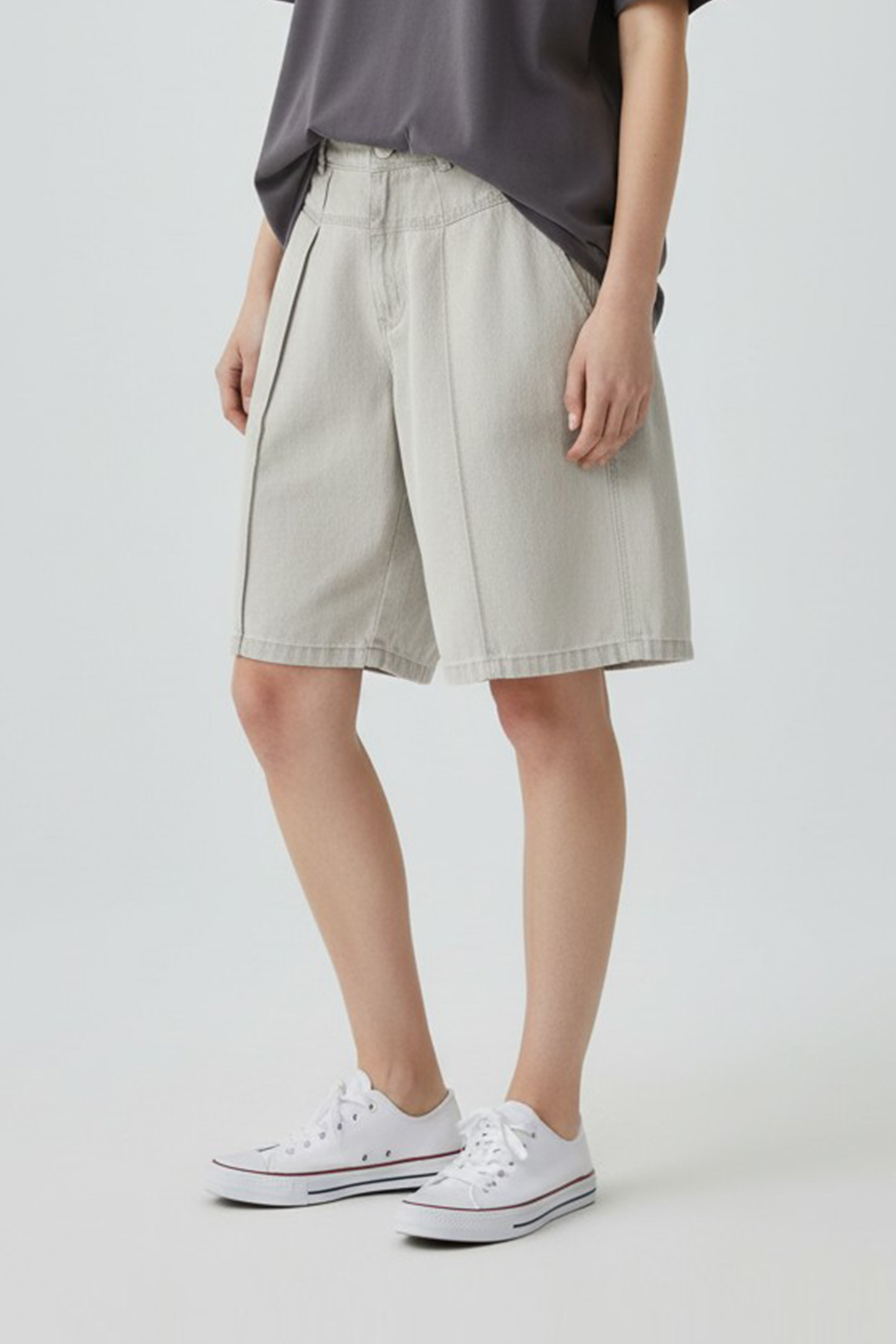 剪接打褶 牛仔中褲