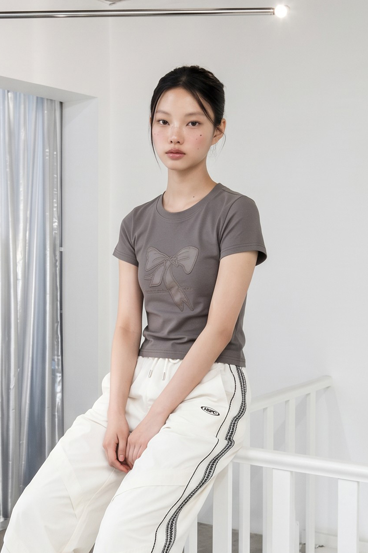 酷甜蝴蝶結短袖上衣(女)