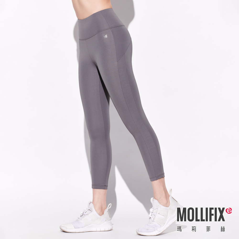 MOLLIFIX 環保弧線拼接七分動塑褲