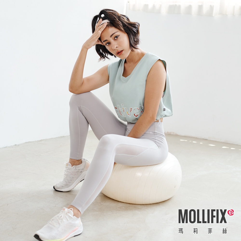 MOLLIFIX 寬版下抽繩街頭短背心
