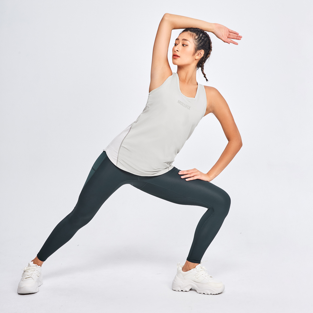 MOLLIFIX 後摺景垂墜拚色運動背心