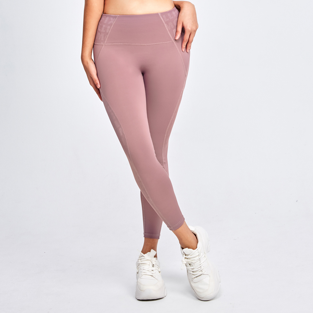 MOLLIFIX 滿版logo拼接修飾動塑褲