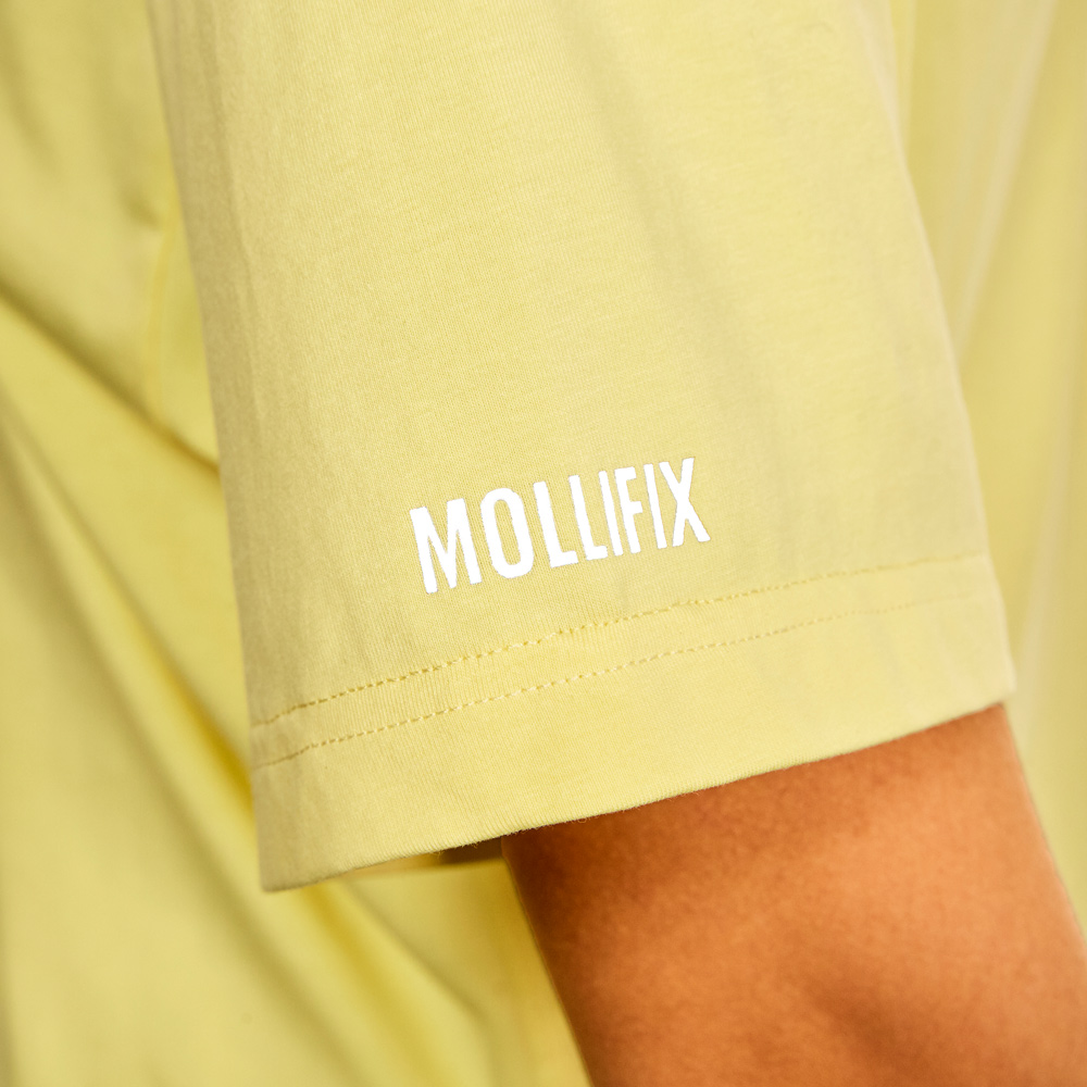 MOLLIFIX 側開衩寬版短袖上衣