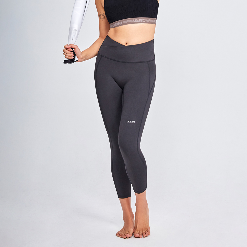 MOLLIFIX 前交叉高腰包覆7分褲