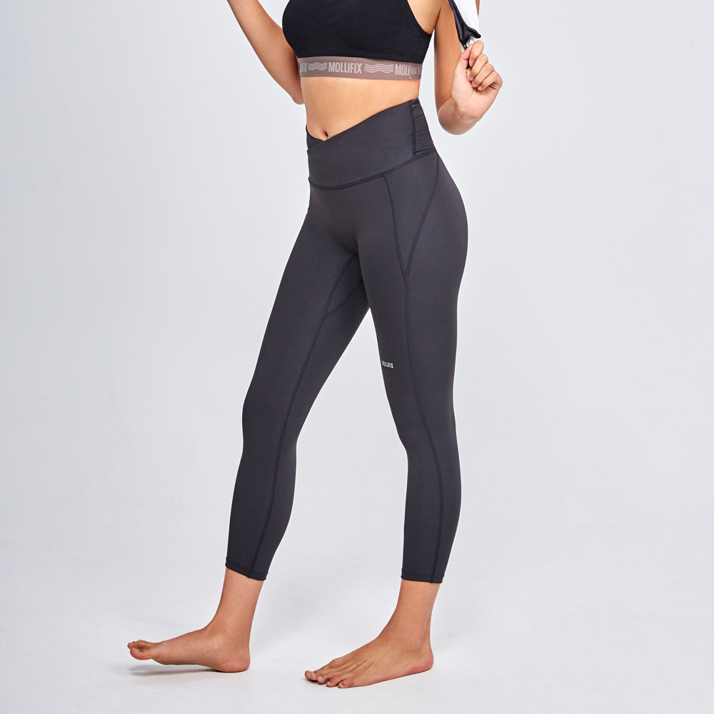 MOLLIFIX 前交叉高腰包覆7分褲