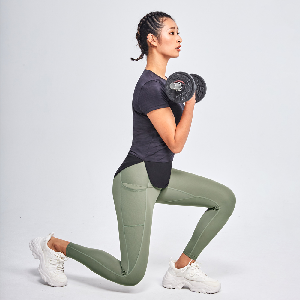 MOLLIFIX 下擺圓弧拚網訓練上衣