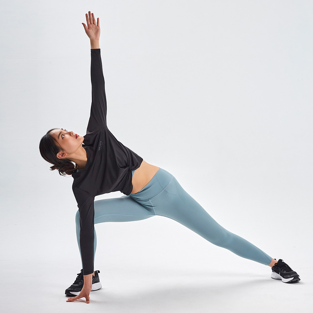 MOLLIFIX 下擺紐結優雅長袖上衣